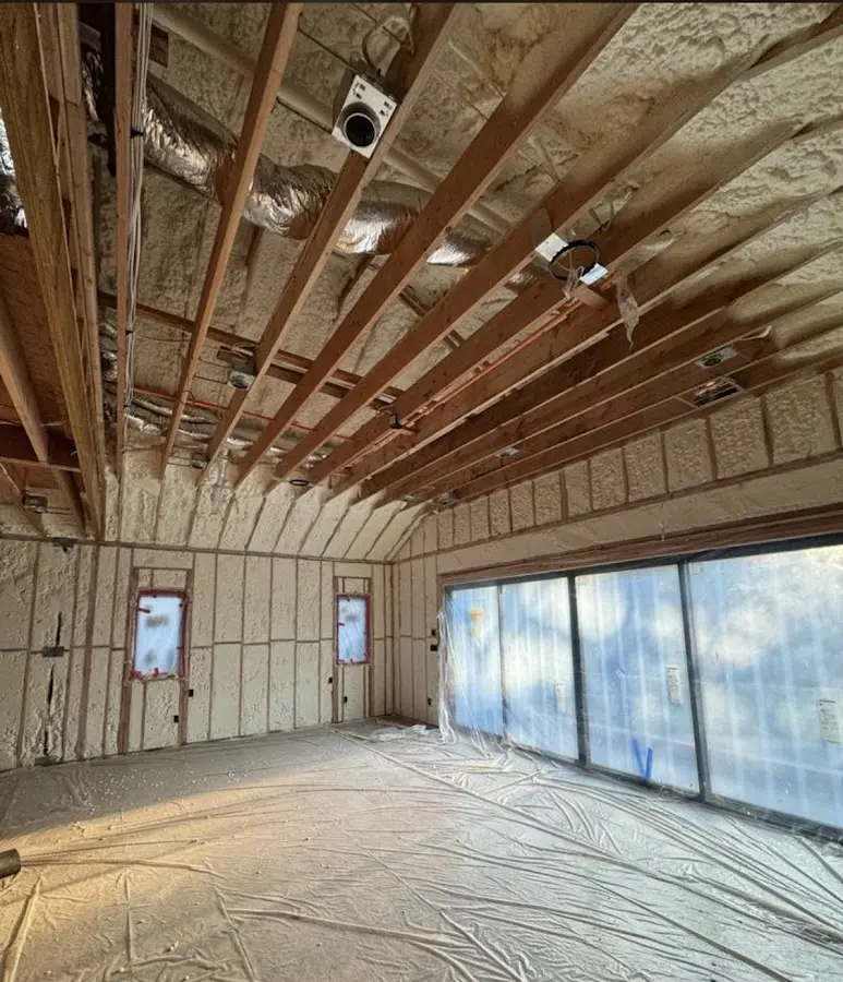 Interior walls and ceiling insulated with spray foam during new construction in DeBary